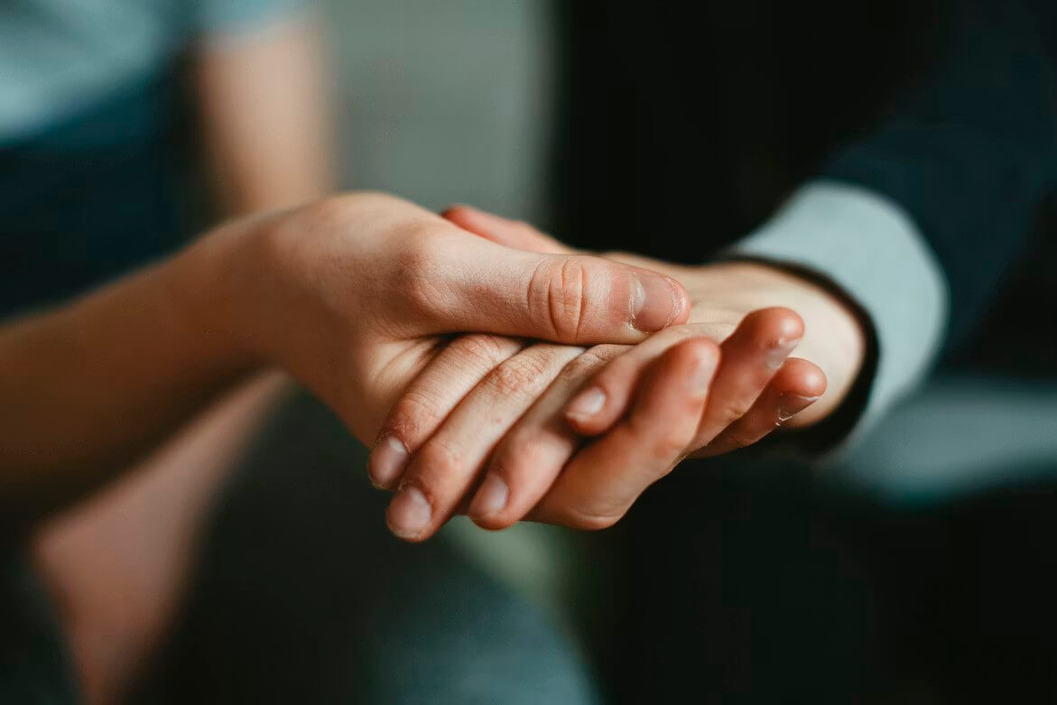 Post8 Two people holding hands